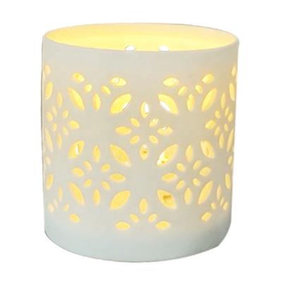 China Special wholesale high quality wedding hollow out ceramic candle holder for home decoration for sale