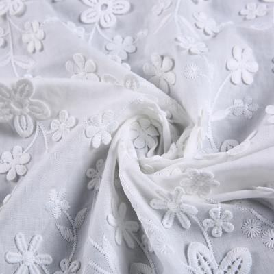 China The latest fashion design all over 3d embroidery voile cotton fabric white flower fabric for sale