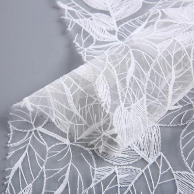 China High quality fashion customized design all over plain organza fabric with embroidery for sale