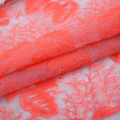 China Latest Fashion Design Red Floral Embroidered Organza Fabric Tulle Fabric for sale