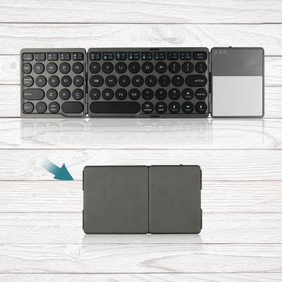 China 2021 Popular Mini Anti-ghosting Three Fold Portable Wireless Keyboard With USB Interface Touchpad For Tablet for sale