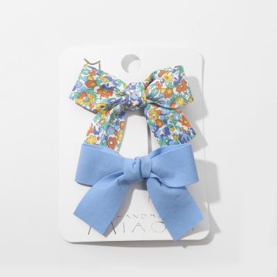 China New floral bowknot small edge clip children's cool solid color fabric press clip set hairpin XD514 for sale