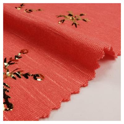 China Anti Pill Fashion After Treatment Knitted Fabric Water Golden Orange 195gsm Rayon Fabric For Dress for sale