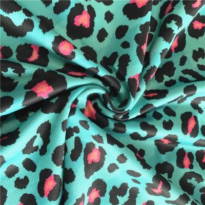 China Leopard Bird Eye Mesh Fabric Pattern Printed Polyester Tear-Resistant Customized Fabric For Garment for sale