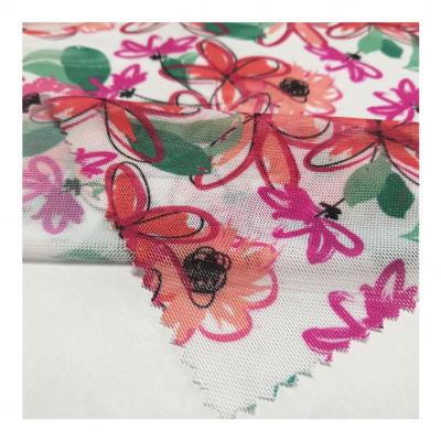 China 2021 Anti-static New Custom Design Print Stretch Flower Bird Eye Digital Mesh Fabric For Dress for sale