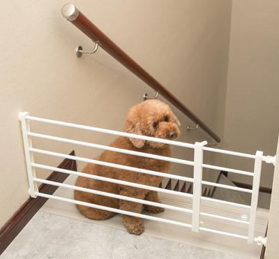 China Amazon Pet Guard Safety Gate Blocking Cat Dog Isolation Retractable Pet Door Warm Viable Barrier for sale