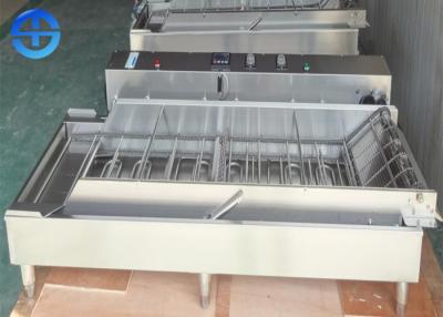 China Automatic Continuous 4 Rows Stainless Steel Donut Fryer Machine for sale