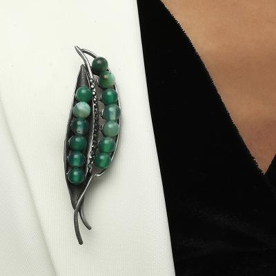 China 2021 Trendy New Arrival Fashion Suits Accessories Accessories Sparkly Green Zircon Crystal Leaf Brooch Pin Cubic Bean Brooch for sale