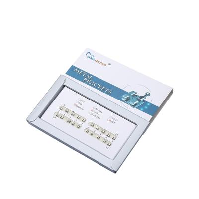 China Metal Metal Mesh Bracket Orthodontic Dental Bracket In Paper Card for sale