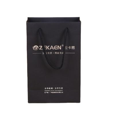 China Custom Logo Black Brown Recyclable Cardboard Kraft Paper Gift Shopping Paper Bags for sale