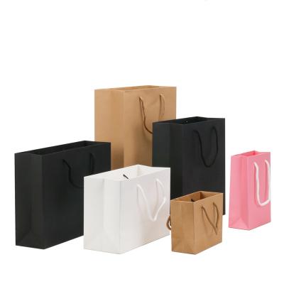 China Recyclable Wholesale Custom Printed Paper Gift Craft Shopping Bags Brown Logo Cardboard Kraft Paper Bags With Handle for sale