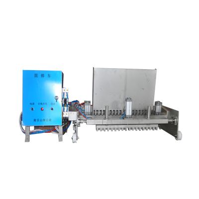 China Dairy Factory Ice Cream Round Stick Enveloping Machine Stick Holder Machine Inserting Sticks for sale