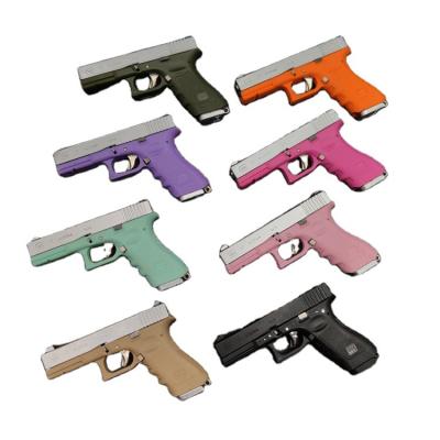 China New 2023 Metal 2023 TAOXI Model Shell Toy Model Launch Key Chain Pendant Eating Plastic Toy Gun Chicken Toy glock G17 Key Chain for sale