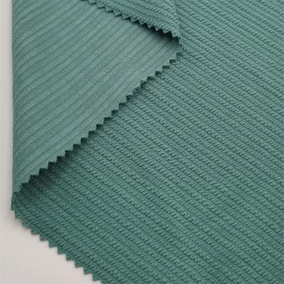 China Stretch New Arrival Rich Texture Jacquard Polyester Spandex Quick Dry Fabric For Sportswear for sale