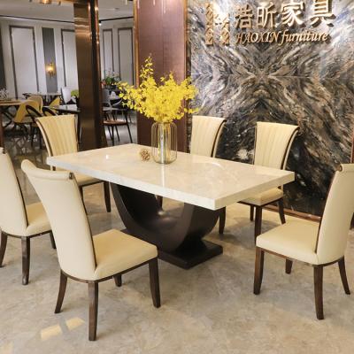 China Strong Luxury Marble Dining Table 6 8 10 Seater Solid Wood Modern White Faux Marble Dining Table Designs Dining Room Furniture Frame for sale