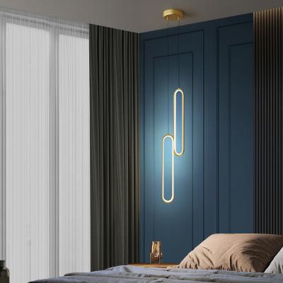 China Modern simple creative bedside chandelier Nordic simple bedroom style living room background wall long row lamp for sale