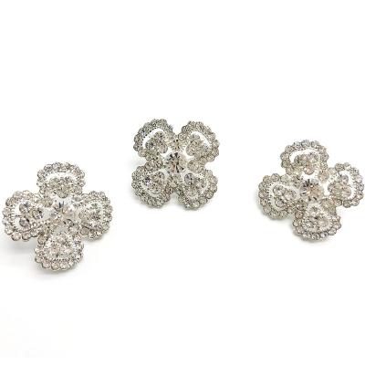 China Leg four part spring leaves with silver color crystal rhinestone metal top plating nickel shiny buttons for women clothing for sale