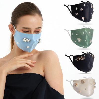 China 2021 new designs popular silk mask with rhinestone flowers ice silk cotton good quality mask for party for sale