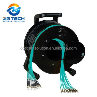 China Multimode FTTH FTTB FTTX Network OM3 Breakout 12Fiber Fiber Optic Patch Cord FTTX Jumper Equipped With Cable Reel for sale