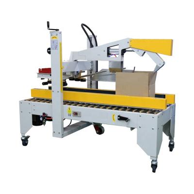 China FX-50D Model Economical Food Paper Cardboard Boxes Folding Sealing Machine for sale