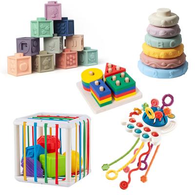 China Eductional Kid Toys Selling infant enlightenment relief soft rubber building blocks educational toys cartoon Knead le early education cognitive for sale