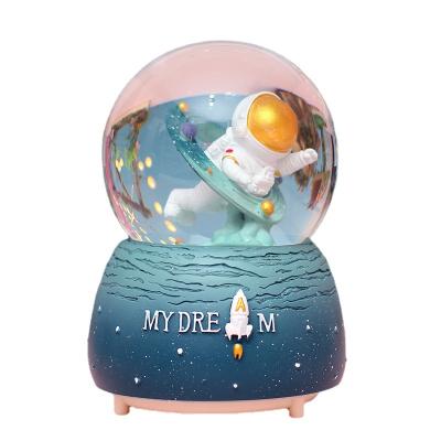 China China Christmas Decorations Gifts Music Box Student Couples Music Box Astronauts Hot Selling Moon Landing Crystal Ball for sale