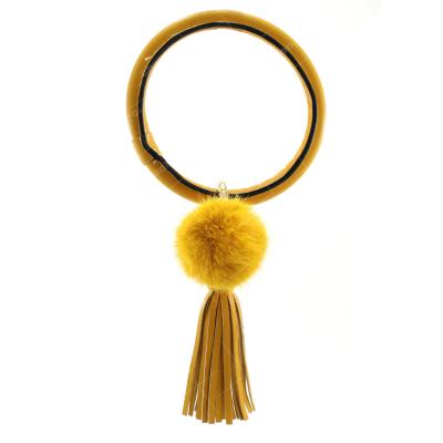 China Women's Key Chain Bracelet Portable Wholesale-Round Bracelet With Tassel-Leather Bracelet Key Chain With Pom Pom for sale