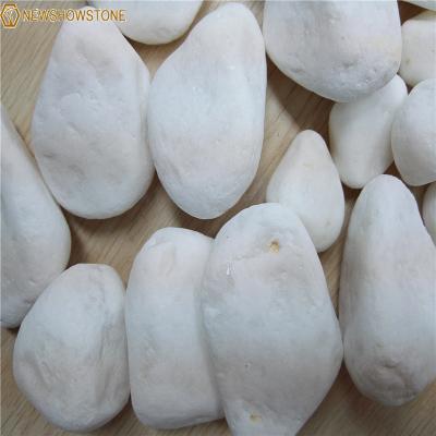 China Modern Polish Decorative White Snow Cobbles Cobblestones for sale