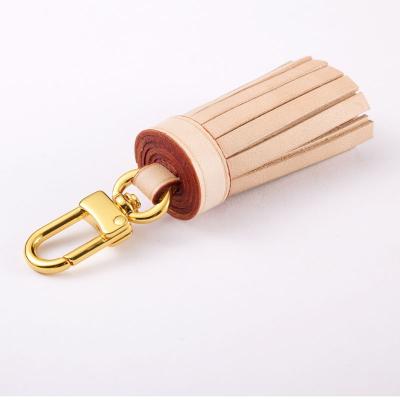 China High Quality Mini Tassel Vachetta Tanning Leather Mini Tassel for Handbag Charm for sale