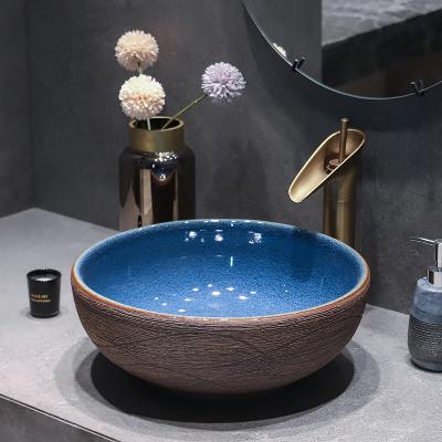 China Jingdezhen luxury and fashion modern antique basin step around ceramic single side washbasin retro art basin household bathroom sink for sale