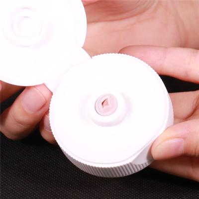 China Non Spill 38mm Neck Finish Top Snap Closure With Silicone Valve For Food And Beverage for sale