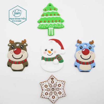 China 100% New Designs Eco-Friendly Personalized Baby Christmas Soother Teether Silicone Chew Toys For Kids for sale