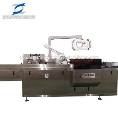 China Food Blister Pillow Bag Cartoning Packaging Machine With Manual Loading And Tract Feeder for sale