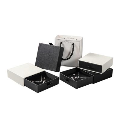 China Recycled Materials Custom Logo Printed Mini Gift Boxes Luxury Eco Friendly Packaging Velvet Earring Paper Drawer Black White Jewelry Boxes for sale