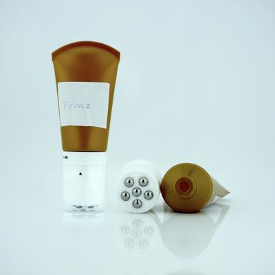 China Cosmetic Body Lotion Plastic Tube With Stainless Massage Roller for sale