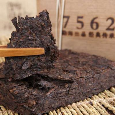 China 7562 Compressed Tea Chinese 250g Black Brick Tea Cheap Price Puer Tea Puer Tea With Bamboo Package for sale