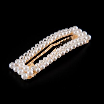 China European and American Women's Hair Clip European and American Women's Hair Pearl Design Fashion Elegant Snap Barrette Stick Hairpin Accessories for sale