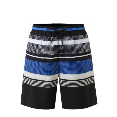 China Breathable 2023 Wholesale Stock Beach Shorts Polyester Men Running Shorts Swimwear Shorts For Men Custom Logo Embroidered Print Tag for sale