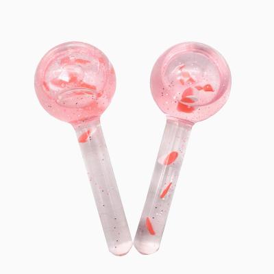 China Wrinkle Remover Pink Ice Globes Facial Massager with Petals Beauty Facial Lifting Ice Balls Cooling Ice Globe Face Roller for sale