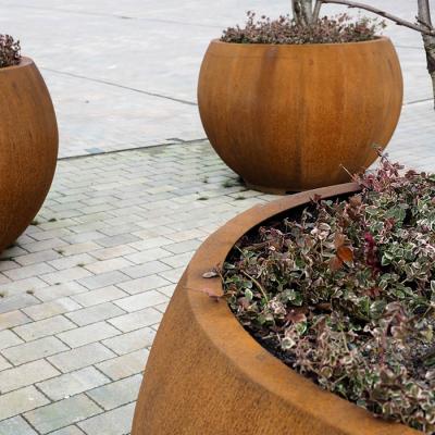 China Weather Resistant Rusty Corten Steel Pot Metal Raised Garden Bed With Low Maintenance And Drainage Hole for sale