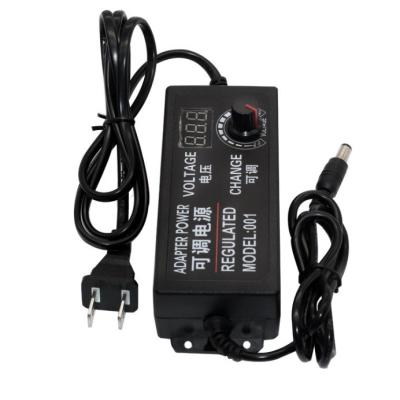 China Adjustable Output C-Power 60W AC100-240V 3V-12V 5A Power Adapter for Desktop Connection for sale