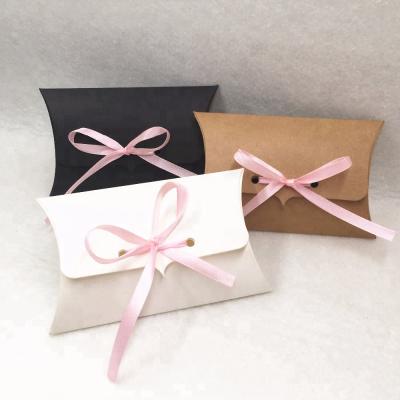 China Recycled Materials Gift Box Kraft Pillow Shape Party Candy Box With Pink Ribbons Party Festive Supplies for sale