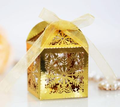 China Recyclable Custom Snow Laser Cut Hollow Favor Gifts Candy Boxes With Ribbon Gift Box for sale