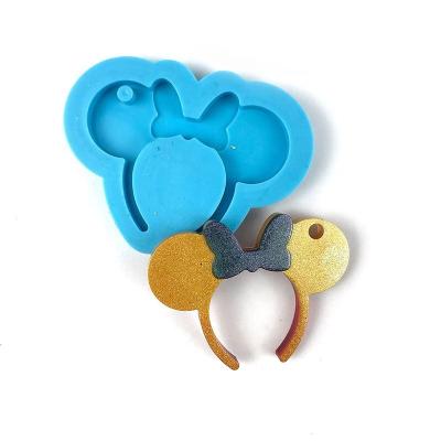 China New Viable Price The Bow Mouse Silicone Resin Jewelry Epoxy Mold Necklace Key Chain Silicone Mold For Design for sale