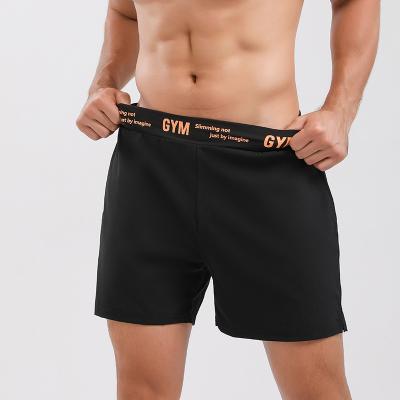 China 2022 Amazon QUICK DRY Mens Sports Shorts Workout Running 2 In 1 Gym Double Decker Training Shorts With Pockets for sale