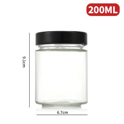 China 200ML Glass Food Storage Containers with Lids Airtight Glass Jars Leak Proof Reusable Sauce Containers for sale