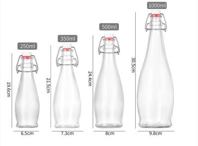 China Luftdichte Gummi-Dichtungen Flip-Caps Klar schwingende Glasflaschen für Getränke zu verkaufen