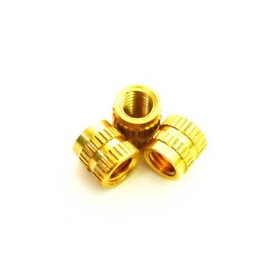 China High Pull Torque and Performance Through Straight Hole Brass Cast In Standard Threaded Insert Nut Fasteners For Plastic for sale