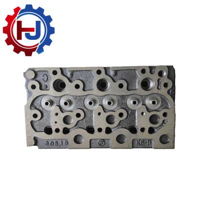 China Buy Well Diesel Engine Cylinder Heads 4 Valve Auto Spare Parts Engine System Assembly For Kubota Diesel Engines D1402 D1402 Tractor for sale