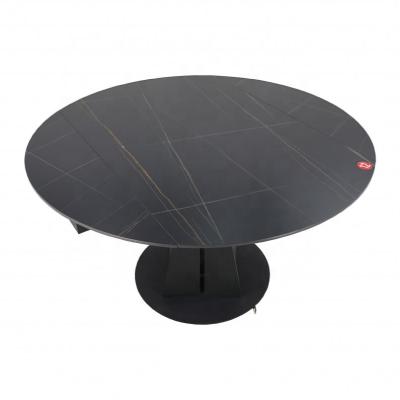 China Newest Modern Sintered Stone Top And Sand Black Carbon Steel Simple Modern Dining Table for sale